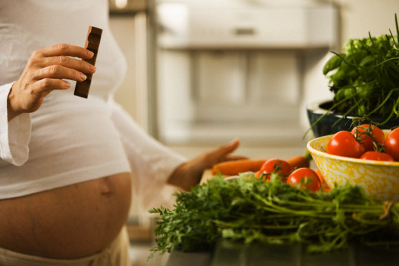 Pregnant Woman Eating Chocolate